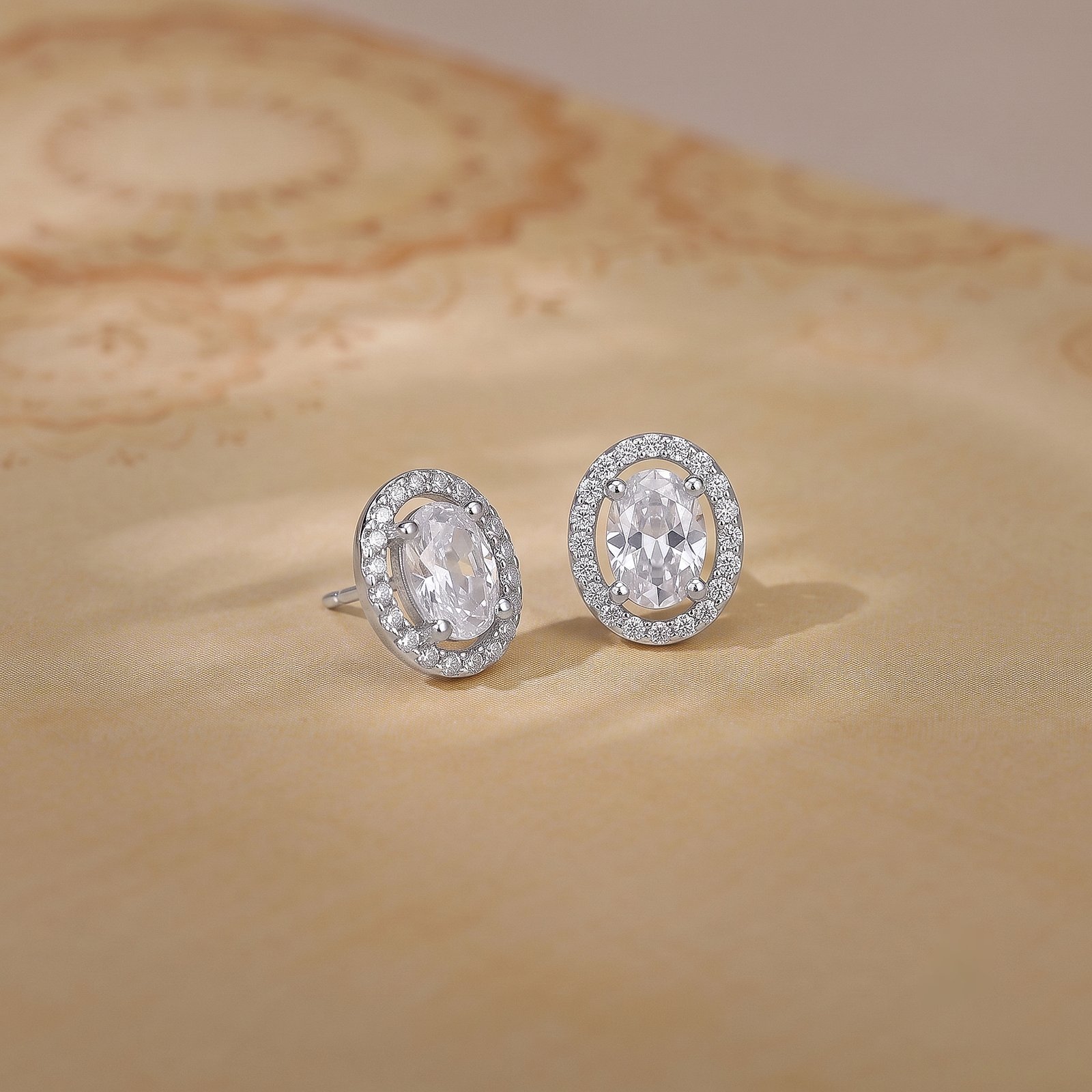 Oval Halo Solitaire Silver Stud Earrings